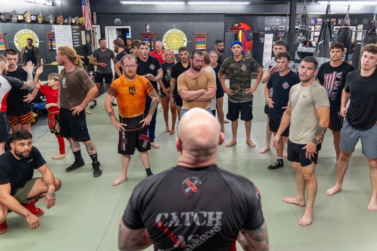 Coach leading an adult class at Tactical Combat Academy