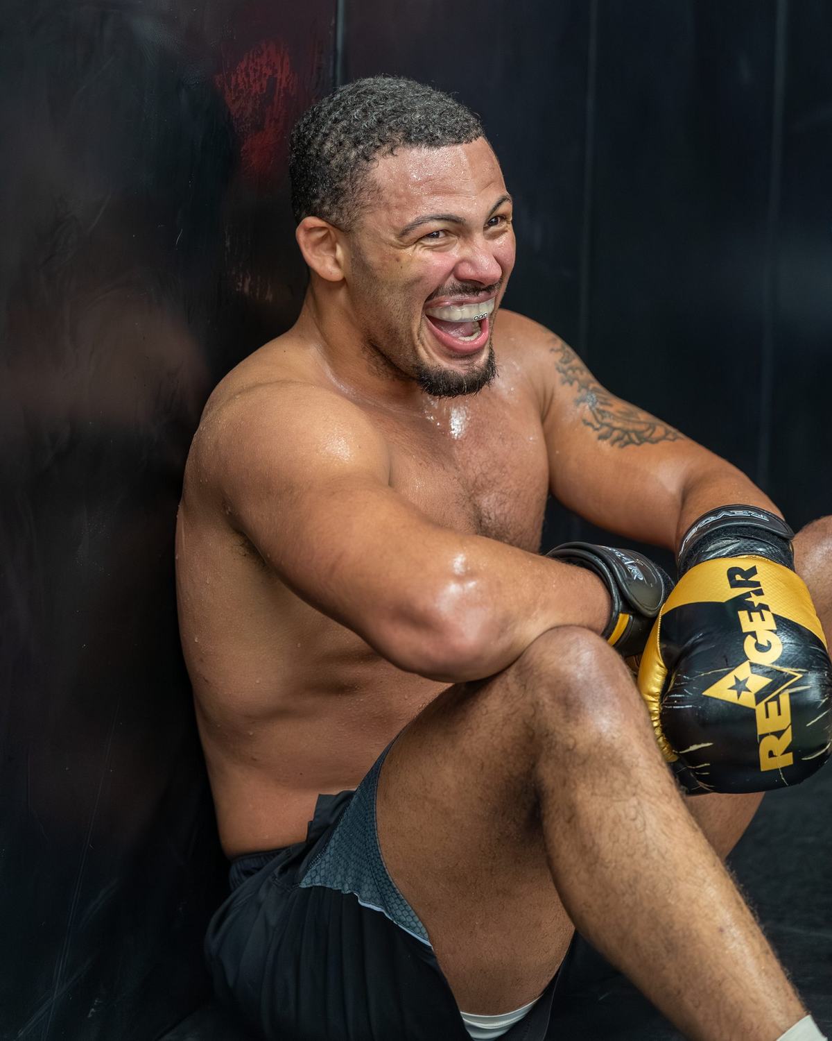 Fighter laughing between rounds
