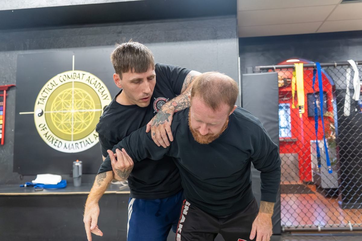 Self-defense drill against a rear attack